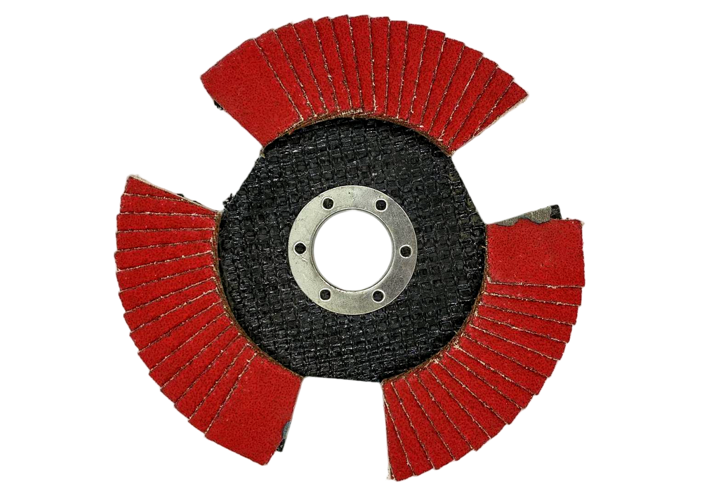 Flap disc with red abrasive material on a white background